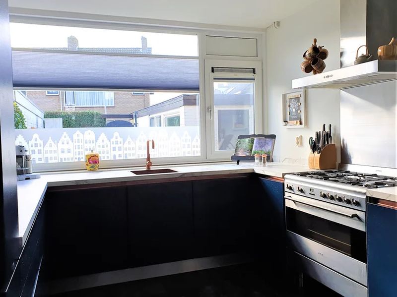 Copper tap against marble countertop
